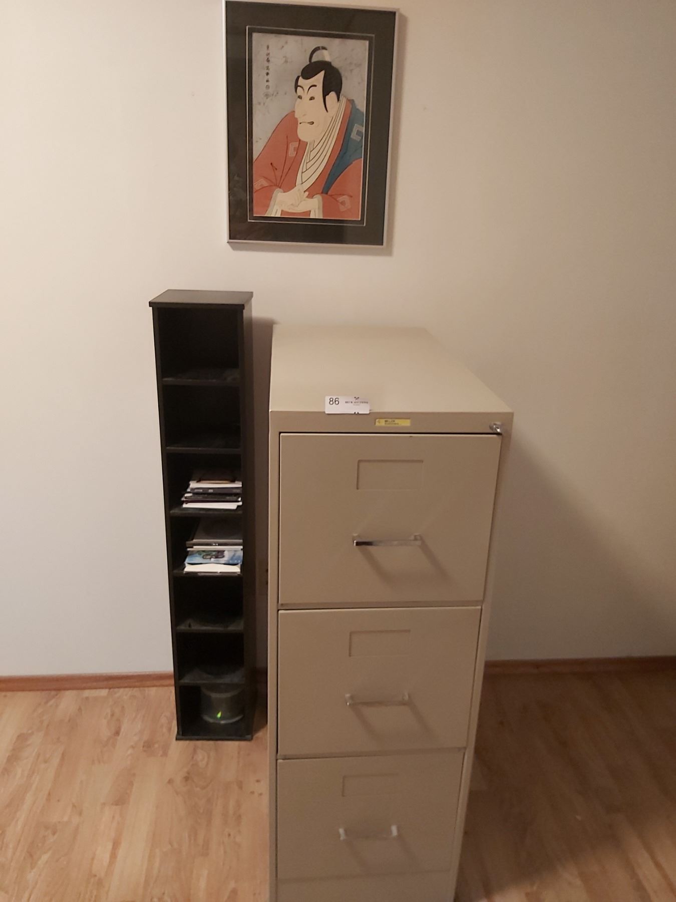 3 Drawer Metal Filing Cabinet, CD/DVD Rack & Picture - Beck Auctions Inc.