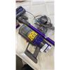 Image 2 : DYSON CYCLONE V10 ANIMAL CORDLESS STICK VACUUM W/ HARD FLOOR HEAD, ACCESSORIES, AND CHARGER - TESTED