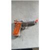 Image 8 : NEON FIRE AIR STRIKE AIR SOFT PISTOL W/ LOTS OF NEW PAPER TARGETS, GOOD CONDITION IN BOX