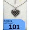 Image 1 : Half Carat Black & White Diamond Heart Necklace 