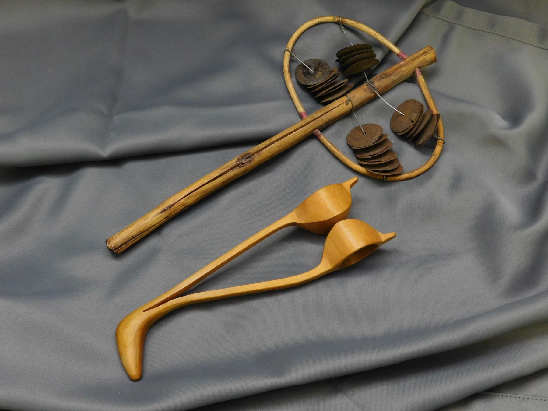 Lot of 2 Primitive Instruments Tamborine / Rain Maker and Wooden Spoons