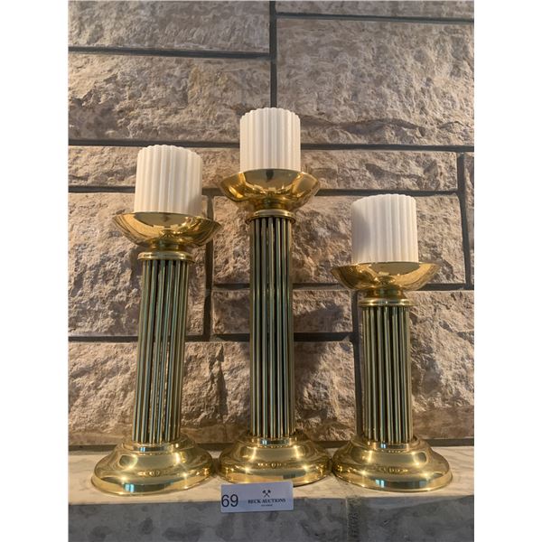 Three Ornate Gold-Toned Candleholders