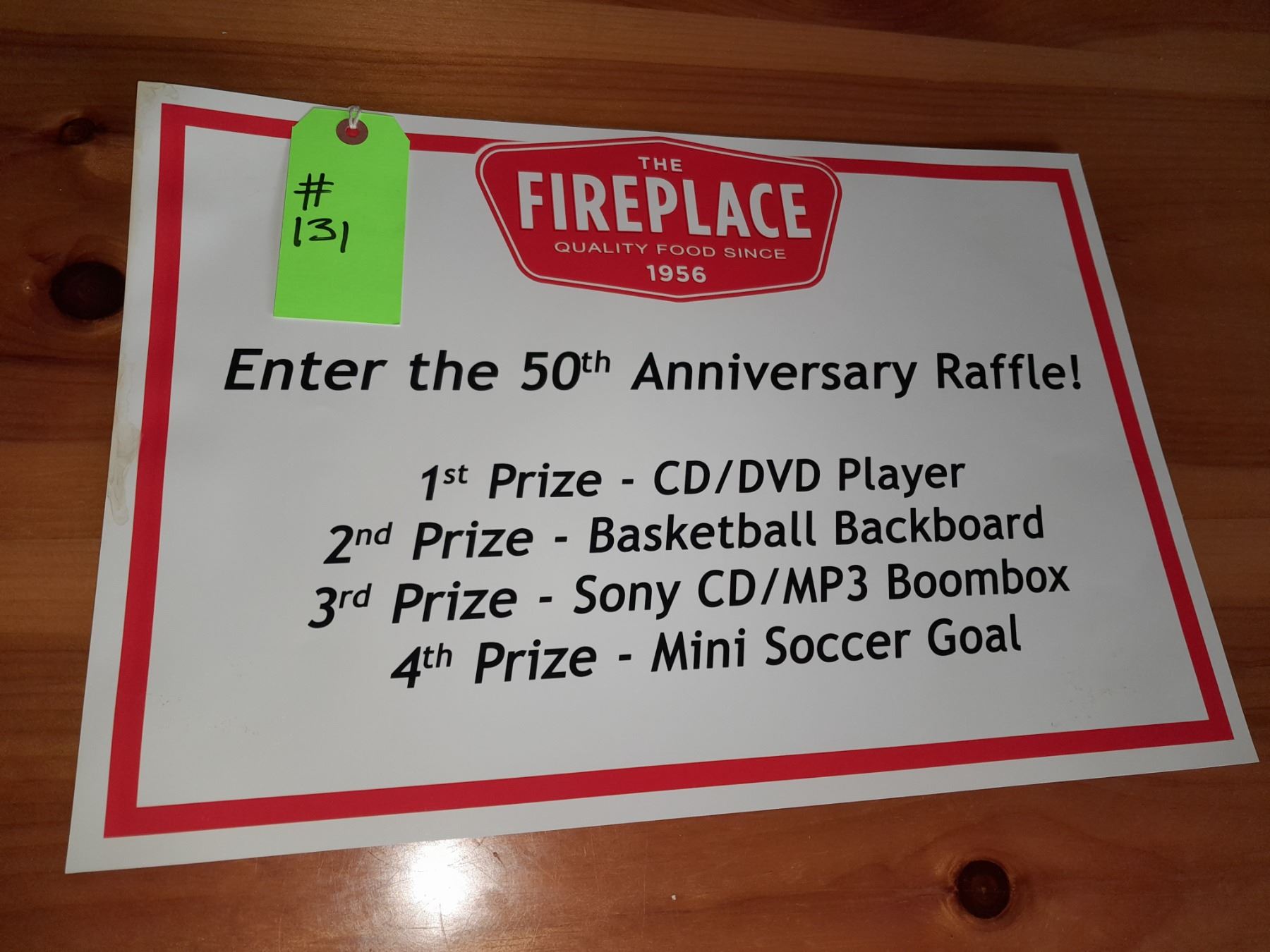 The Fireplace Restaurant - Enther The 50th Anniversary Raffle Sign