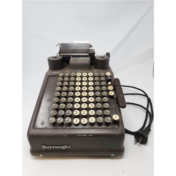Antique adding machine