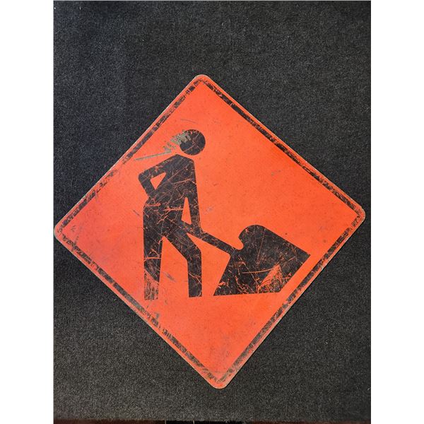 Metal mancave sign