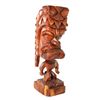 CARVED KAULANI STATE PRISON TIKI FIGURE WITH BIG CHIN.