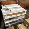 Image 1 : Pallet full of LED ceiling light fixtures