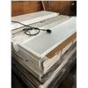 Image 2 : Pallet full of LED ceiling light fixtures