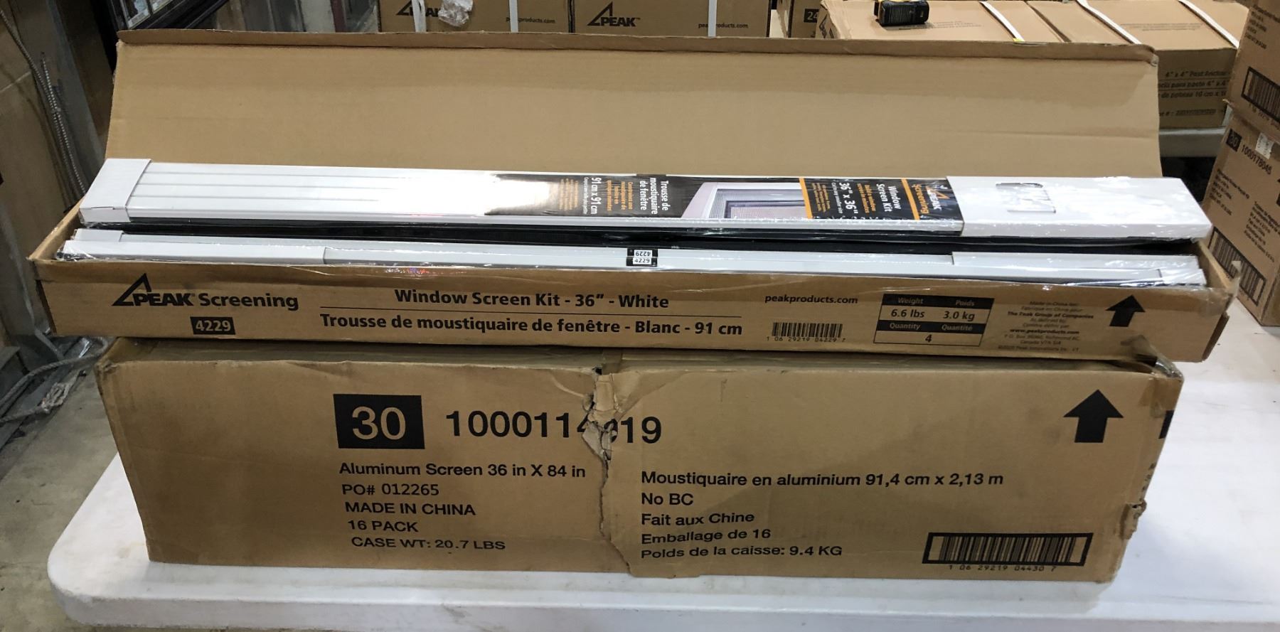Box full of new Peak Screening 36in x 36in window screen kits w/ box of ...