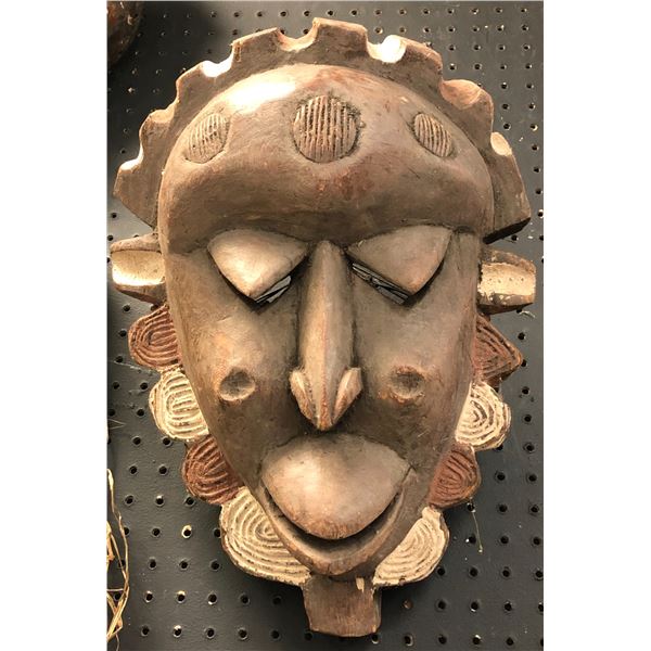 West African hand-carved "protector for evil spirit - Angola" tribal wooden mask - approx 17" long