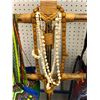 Image 2 : Wooden display stand w/ bone beads necklaces / 4 African assorted bags & purses & bag with Buddha de