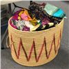 Image 1 : Basket filled w/ assorted African scarves / sheets / cloths / bedding etc