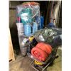 Image 1 : Pallet full of misc. set dec items - includes jerry cans/ camping sleeping bags/ plastic liquid cont