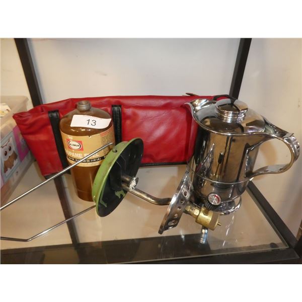 percolator, camp lamp, propane bottle, gun bag