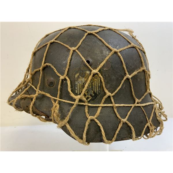 WWII GERMAN ARMY M35 SD COMBAT HELMET COMPLETE WITH LINER AND CAMOUFLAGE NET