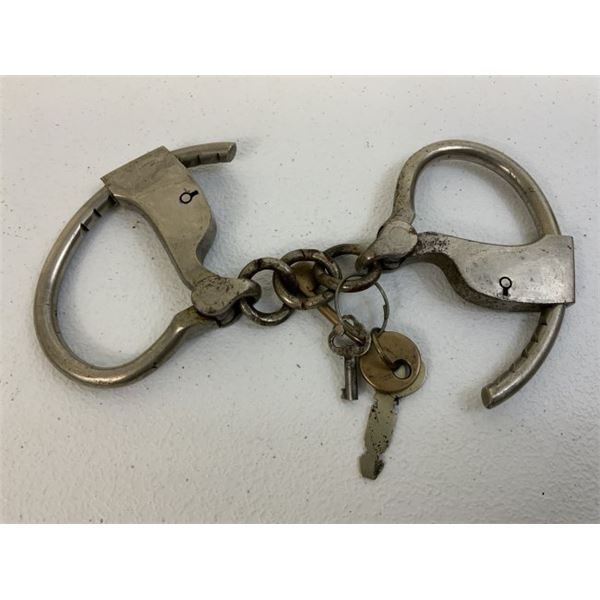 ANTIQUE PAIR OF HANDCUFFS WITH KEYS