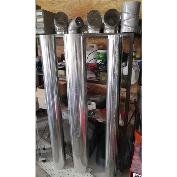 Assortment of Heating Vent Pipes - 4 x 5"; 2x 6"; 4 x 4"; 3 x 4" 90s; and 5 x 6" 90s.