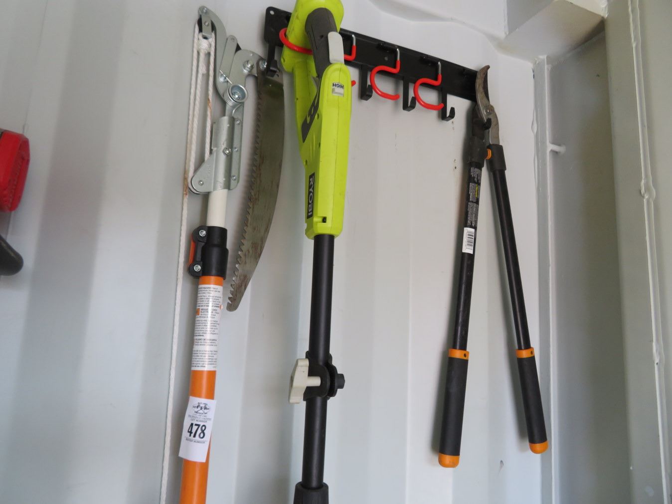 Yard Tools On Wall, Ryobi Trimmer, Chainsaw Post Hole Digger