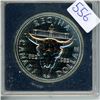 Image 1 : 1982 Regina Centennial Silver Dollar. Bison skull. Specimen. Housed in its original hard plastic hol