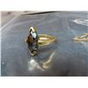 Image 3 : Gold ring stamped 10K with black stone – (stone chipped & Authenticity unchecked) & delicate necklac