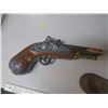 Image 2 : brown pistol decanter with stand