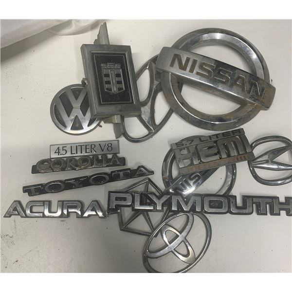 Nissan, VW, Corolla, Toyota, Acura, plymouth emblams