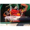 Image 2 : tub of clamps, level, chainsaw sharpener guide