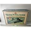 Image 1 : The Master Putting System in Box