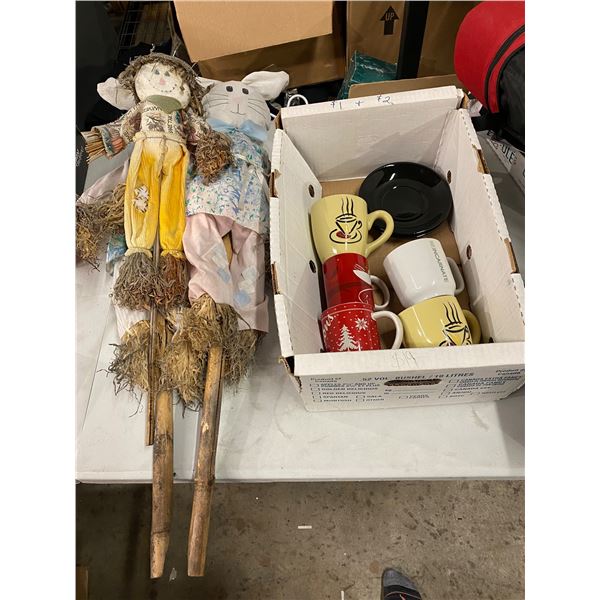 Scarecrow, star bucks and Tim Hortons mugs