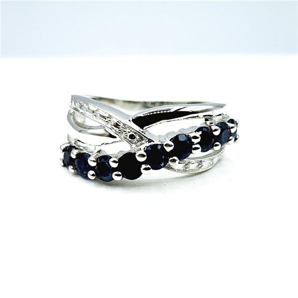 .925 Sterling Silver Ring, Size 7, Nine Natural Round Cut Blue Saphires = 1.26ct. Appraisal:$400.00