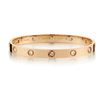 Image 1 : CARTIER "LOVE COLLECTION" IN 18KT ROSE GOLD WITH 10 DIAMONDS. SIZE 17.