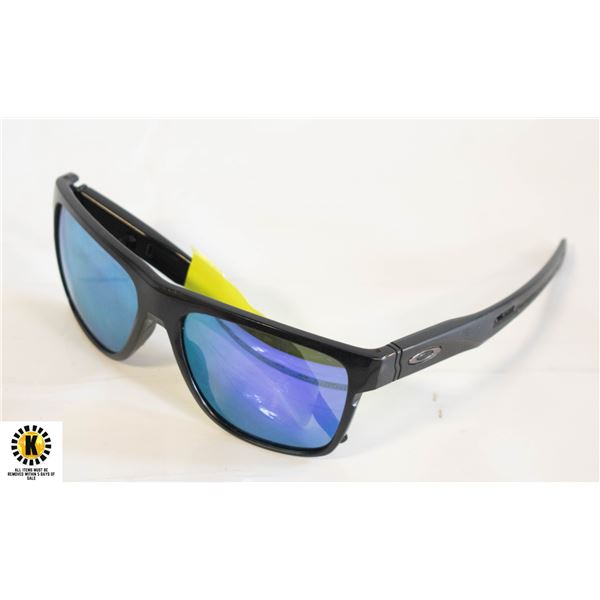 PAIR OF POLARIZED OAKLEY SUNGLASSES