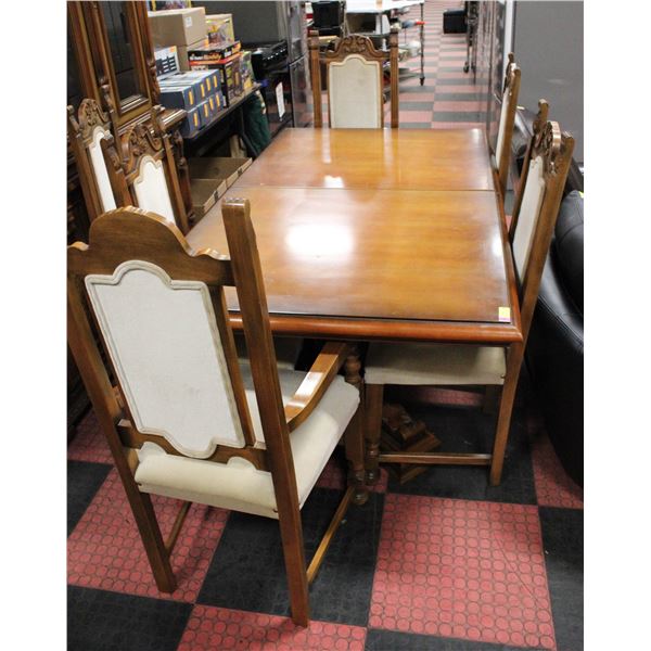 SOLID CARVED WOOD TABLE WITH 6 ORNATELY CARVED