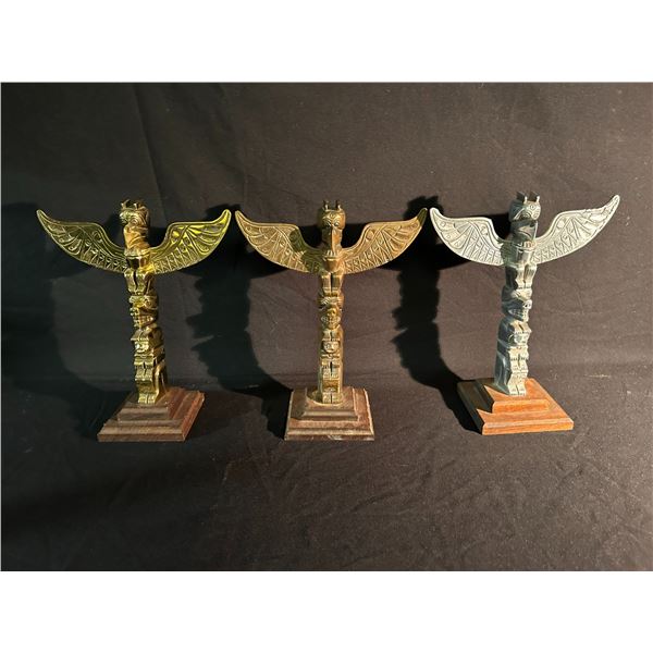 LOT OF 3 CAST METAL 3 FIGURE TOTEM POLES, EAGLE, BEAR AND BEAVER.