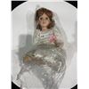Image 1 : A Collectible Porcelain Doll