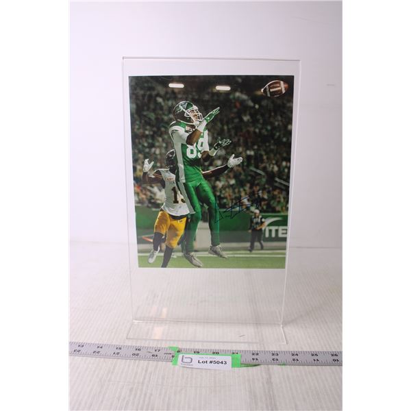 Saskatchewan Roughriders Autographed Photo in Plastic (Not Authenticated)