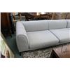 Image 2 : Natuzzi Italia two piece sectional on polished gunmetal toned tapered supports, 116" X 90"