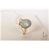 Image 1 : 18kt yellow gold ring set with oval opal, note: opal is cracked, size 6.5