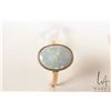 Image 2 : 18kt yellow gold ring set with oval opal, note: opal is cracked, size 6.5