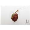 Image 1 : 10kt yellow gold pendant set with oval ammonite gemstone