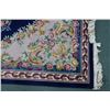 Image 2 : Large sculpted wool carpet with center medallion, overall floral motif, fringed edge, blue backgroun