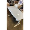 Image 1 : SEVILLE CLASSICS ELECTRIC ADJUSTABLE GLASSTOP DESK POWERS ON SHOWS 29.0 DOES NOT GO UP