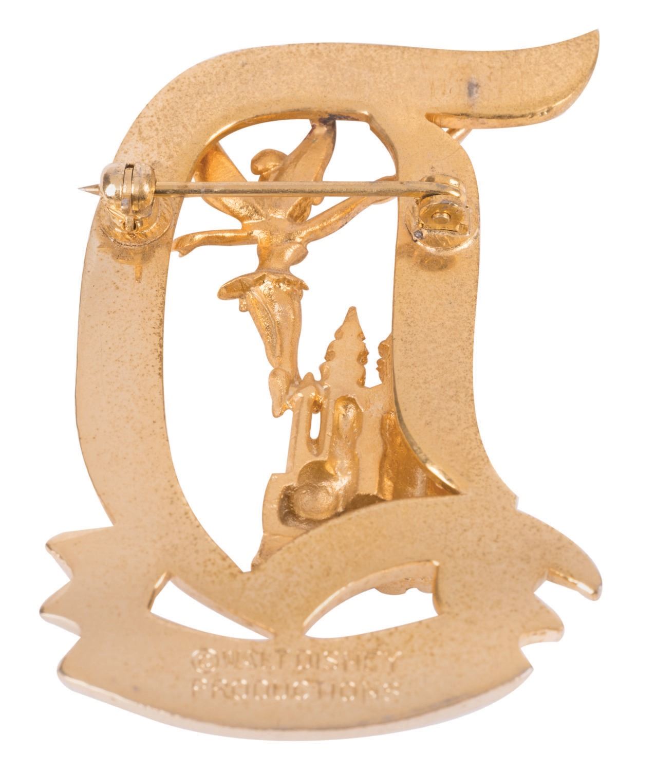 A Disneyland Tour Guide Pin.