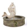 Image 4 : A Snow White's Grotto Dancing Fish Figure.