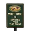 Image 1 : An Original Kilimanjaro Safaris Wait Time Sign.