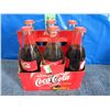 Image 1 : Coca-Cola cardboard case with six full bottles