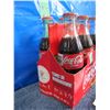 Image 2 : Coca-Cola cardboard case with six full bottles