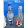 Image 8 : Collection of Pepsi advertising items and bottles