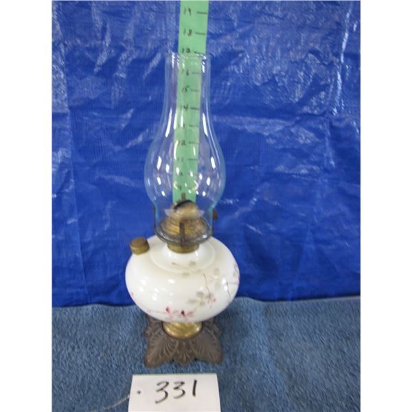Vintage oil lamp painted with pink flowers & cast base
