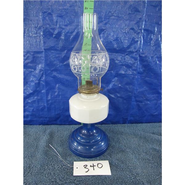 Vintage oil lamp with blue and white glass base